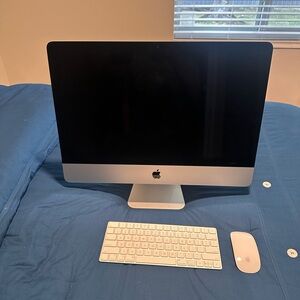 Apple Silver Desktop Computer with Keyboard and Mouse